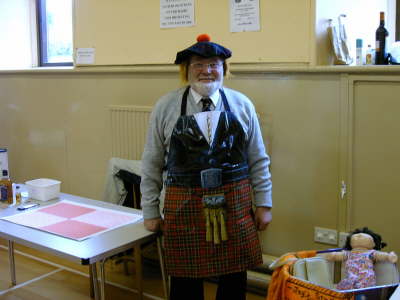 Jim Husband in costume at the Bottle Stall