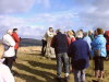 The Revd Neil Gardner leads singing & prayers at the top.