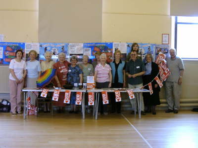 L-R: Elasaidh Mollison, Morag Thomson, Pam Thom, Janey MacFarlane, Margaret Aitchison, Dorothy Lindsay, Anne-Marie White, Agnes Kettles, Margaret Gillison, Sean & Moira Topen-Cooper, Rev. Sheila Kirk, Dick Poor