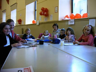 Local children joined Primary Sunday School teacher, Elasaidh Mollison, at the colouring-in corner.